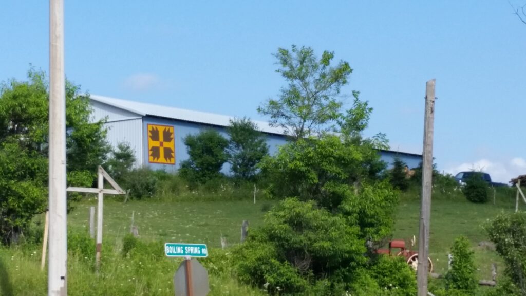 bear paw barn quilt wide angle distant photo